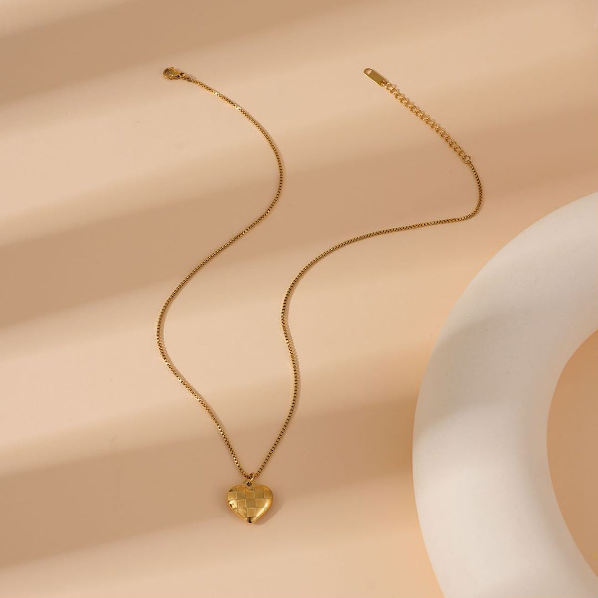 Collier pendentif cœur damier en acier inoxydable