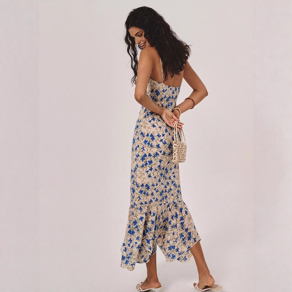 Robe longue fluide à motifs floraux et ceinture cintrante