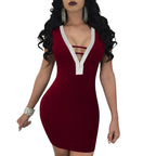 Elégante robe courte moulante col v plongeant dos nu contour strass
