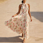 Flowy halter-neck wrap dress with floral print