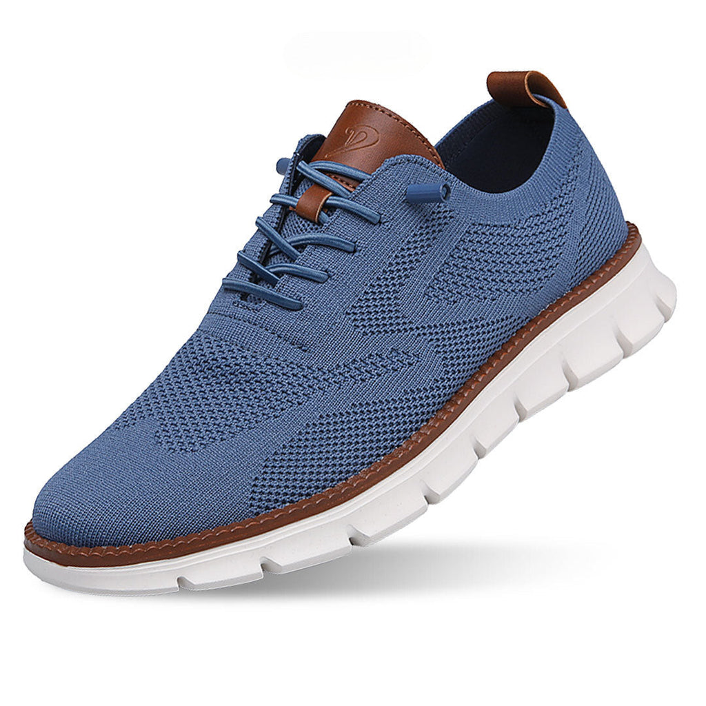 Chaussure de sport bleue pour homme avec semelle blanche, lacets assortis et détails marron. Design respirant et moderne. Idéale pour le confort quotidien.
