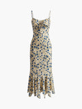Robe longue fluide à motifs floraux et ceinture cintrante