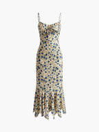 Robe longue fluide à motifs floraux et ceinture cintrante