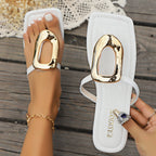 Flat sandals with metal buckle