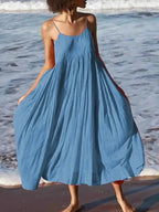 Sleeveless fluid midi wrap dress