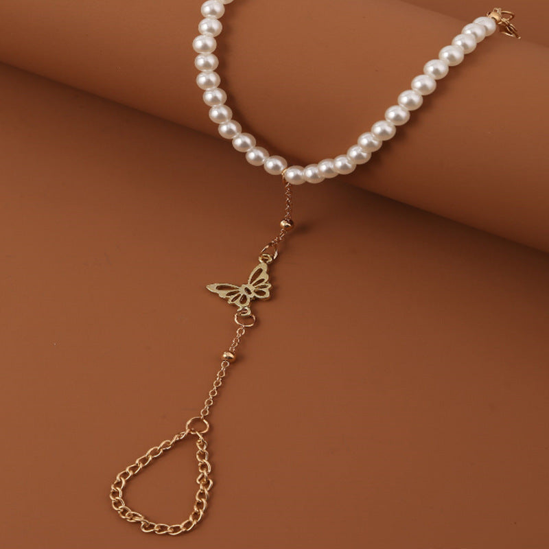 Bracelet en perle avec pendentif papillon