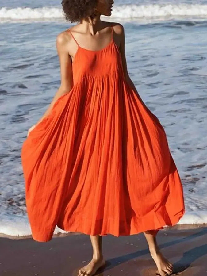 Sleeveless fluid midi wrap dress