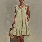 Robe droite sans manches, col rond et volants