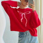 Pull rétro à nœud en jacquard brillant
