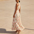 Flowy halter-neck wrap dress with floral print