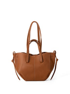 Sac à main en cuir marron avec doubles anses, design moderne et élégant. Accessoire mode femme, idéal pour un look chic et tendance.