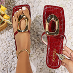 Flat sandals with metal buckle