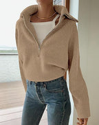 Ribbed knit jumper with a stand-up collar and zip fastening