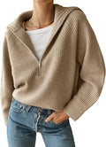 Ribbed knit jumper with a stand-up collar and zip fastening