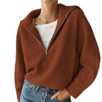 Ribbed knit jumper with a stand-up collar and zip fastening
