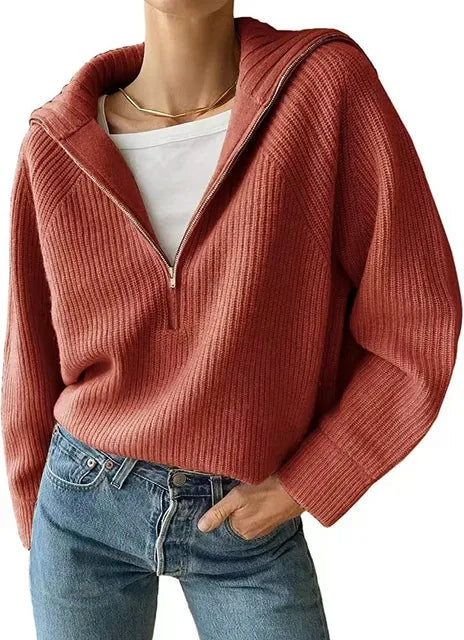 Ribbed knit jumper with a stand-up collar and zip fastening