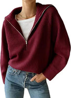 Ribbed knit jumper with a stand-up collar and zip fastening