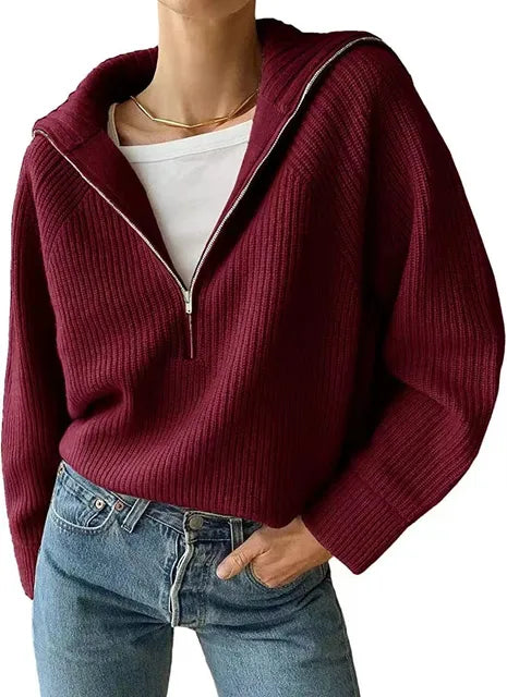 Ribbed knit jumper with a stand-up collar and zip fastening