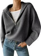 Ribbed knit jumper with a stand-up collar and zip fastening