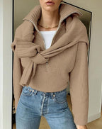 Ribbed knit jumper with a stand-up collar and zip fastening