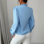 Chemisier élégant à manches longues et col boutonné asymétrique