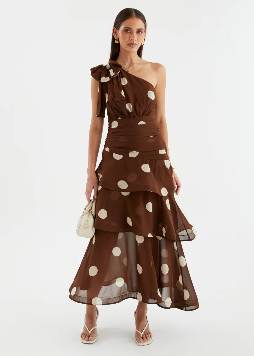 Asymmetrical polka dot dress with openwork details