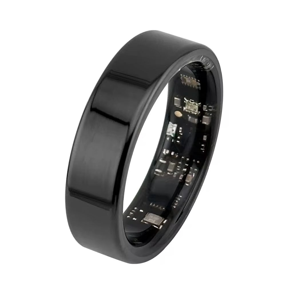 Bague intelligente noire en titane avec capteurs intégrés, technologie portable, design moderne, suivi santé, accessoire connecté innovant.