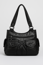 Sac à main noir en cuir avec poches avant, fermetures éclair et détails en forme de cœur. Élégant et pratique pour un usage quotidien.
