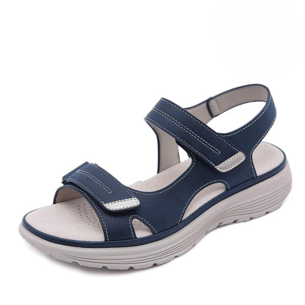 Sandale de marche bleue pour femme avec semelle antidérapante, fermeture velcro, design ergonomique, idéale pour randonnée et confort quotidien.