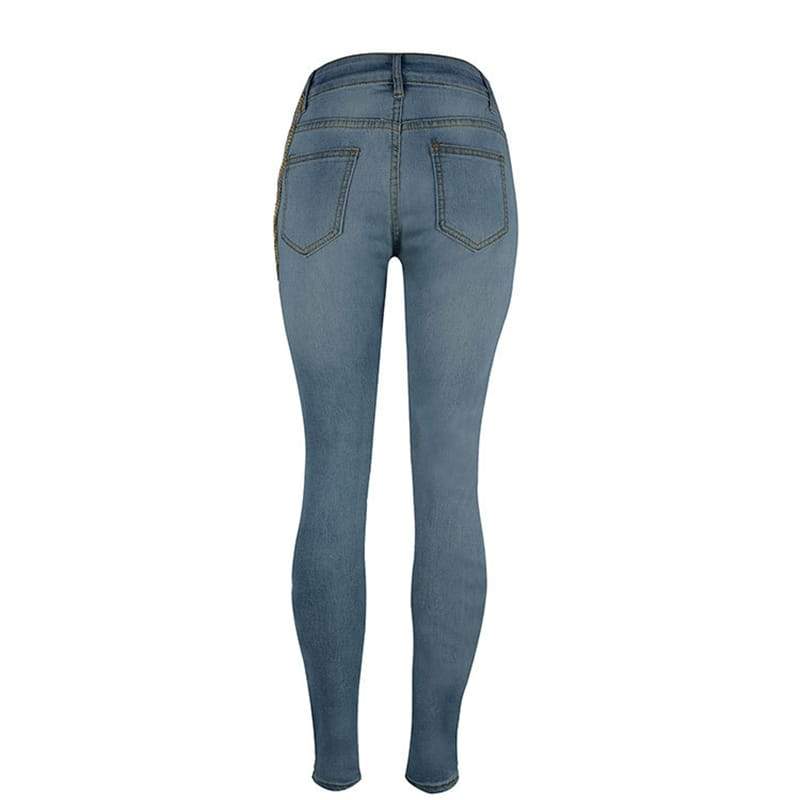 Distressed skinny jeans with chain
