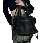 Women's structured shoulder bag with washed finish and compartments