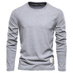 T-shirt gris à manches longues pour homme, col rond, style décontracté, tissu en coton, idéal pour mode automne-hiver, vêtement basique polyvalent.