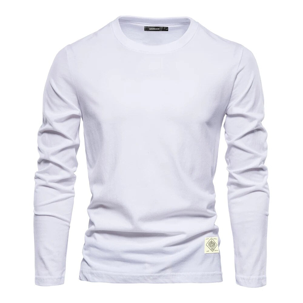 T-shirt blanc à manches longues pour homme, col rond, style décontracté, coton, idéal pour mode automne-hiver, vêtement basique polyvalent.