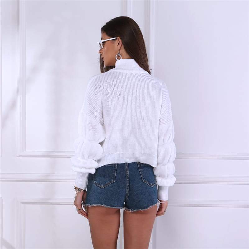Pull col montant manches bouffantes