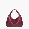 Sac à main en cuir tressé bordeaux, design moderne et élégant, idéal pour la mode féminine. Accessoire tendance pour toutes occasions.