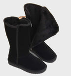 Bottes noires en daim avec doublure en fourrure, semelle antidérapante, style hiver chaud, idéales pour temps froid, mode féminine élégante.
