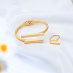 Adjustable metal bracelet and ring jewelry set