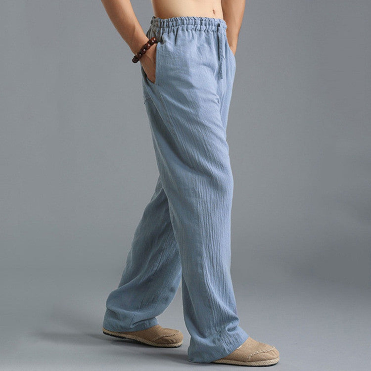 Pantalon ample en lin bleu clair pour homme, style décontracté, avec taille élastique et poches latérales, idéal pour l'été et le confort quotidien.