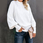 Pull en grosse maille pour femme avec col haut et manches volumineuses