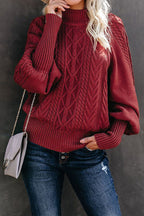 Pull en grosse maille pour femme avec col haut et manches volumineuses