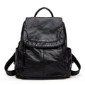 Sac à dos en cuir noir élégant, design moderne, poches latérales, idéal pour le quotidien ou le voyage. Accessoire mode pratique et tendance.