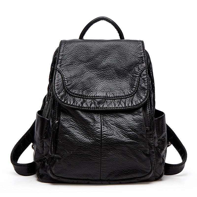 Sac à dos en cuir noir élégant, design moderne, poches latérales, idéal pour le quotidien ou le voyage. Accessoire mode pratique et tendance.