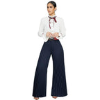 Pantalon à jambe large Pli de couleur unie