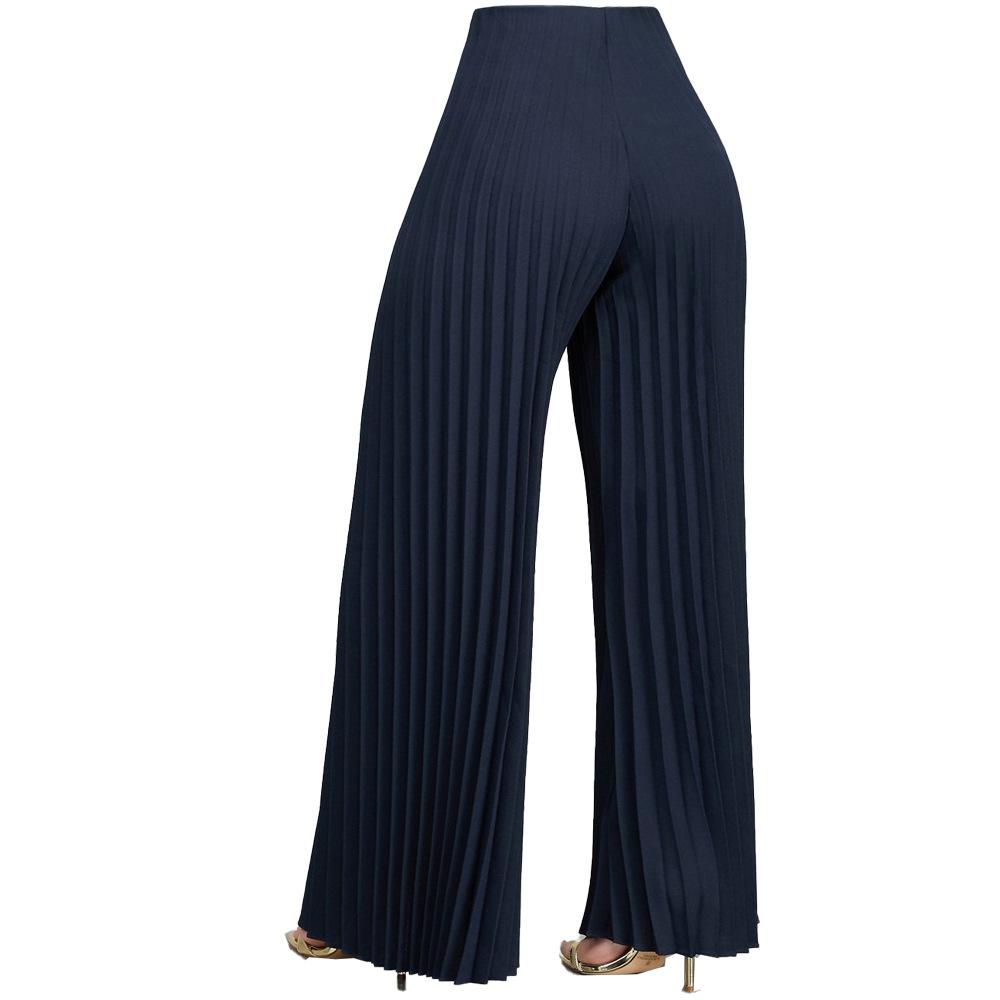 Pantalon jambe large à pli de couleur unie