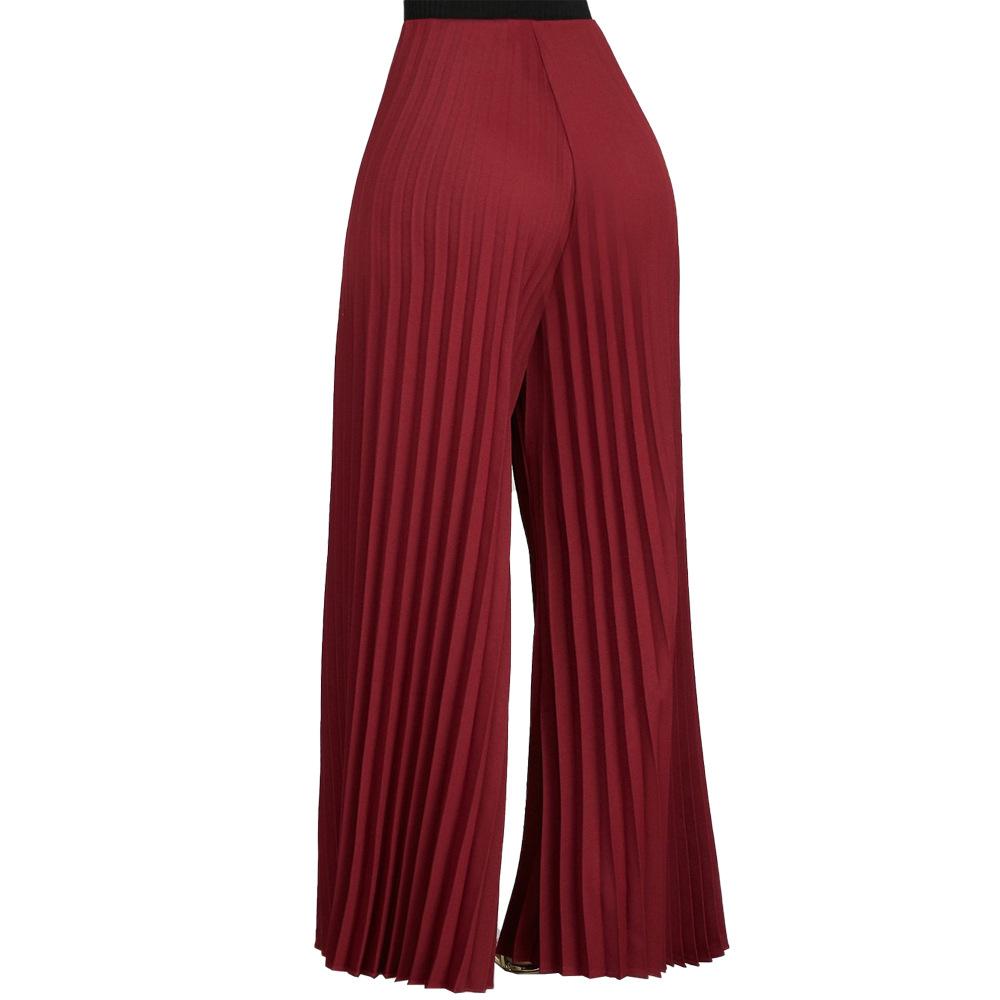 Pantalon jambe large à pli de couleur unie