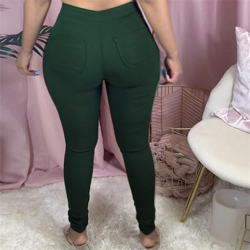 Pantalon moulant élastique à poche arrière couleur unie