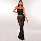 Robe longue transparente en maille à fine bretelles dos nu fente latérale