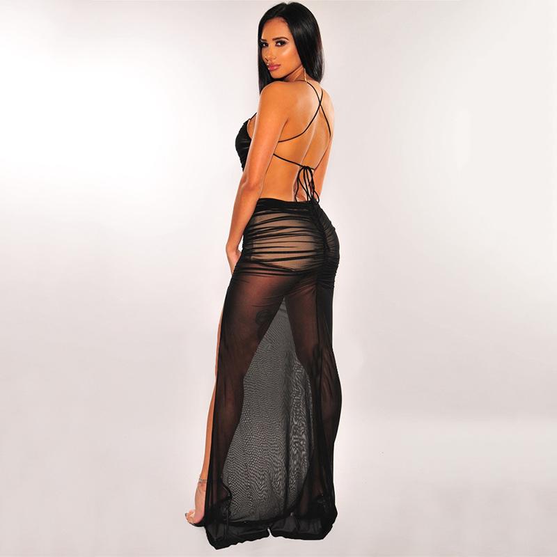 Robe longue transparente en maille à fine bretelles dos nu fente latérale