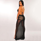 Robe longue transparente en maille à fine bretelles dos nu fente latérale