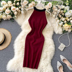 Robe longue moulante col rond à déco bouton